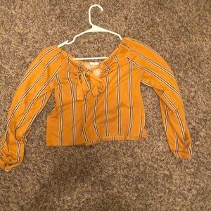 mustard yellow shirt